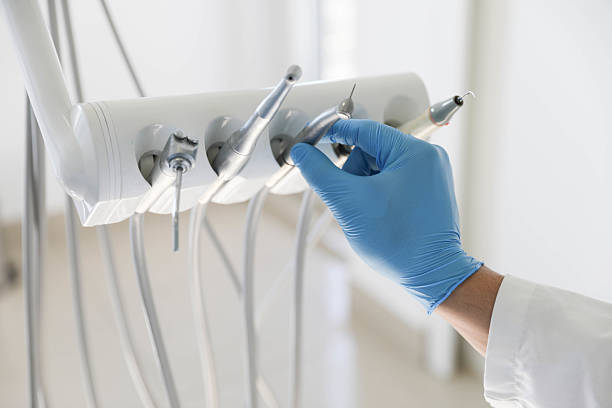 Professional Tooth Extraction technician working in Brighton, MI